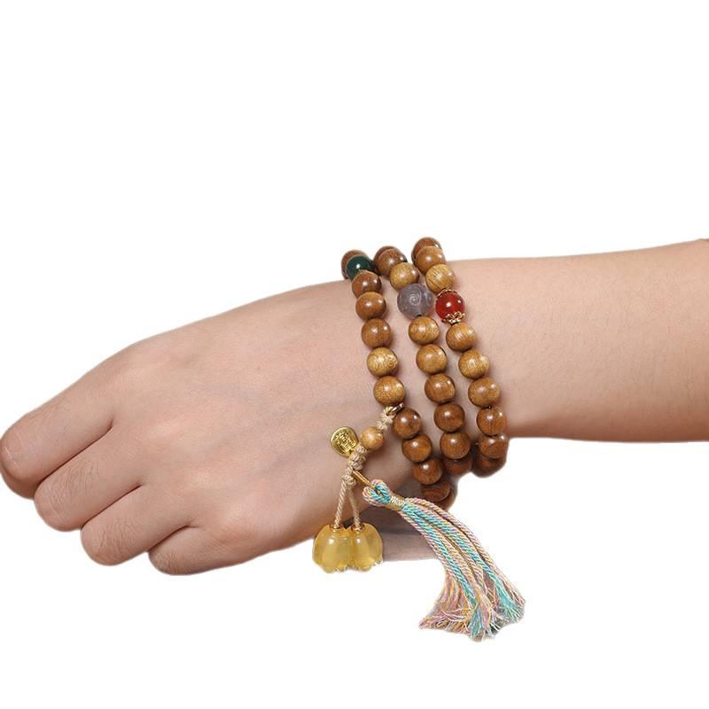 Armband aus goldenem Sandelholzperlen mit Quaste: Unisex Multi-Wrap Rosenkranz im alten chinesischen Stil.