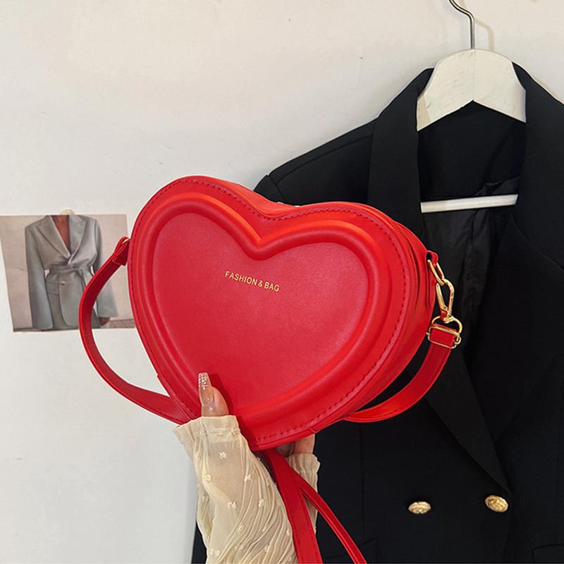 Modische Umhängetaschen in Herzform für Damen Neue einfarbige PU-Leder-Umhängetasche Lässige Damen-Handtaschen Designer-Taschen Qualität