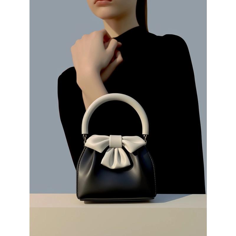 Fashiable and versatile color blocking small square bag with bow and pleated black handbag