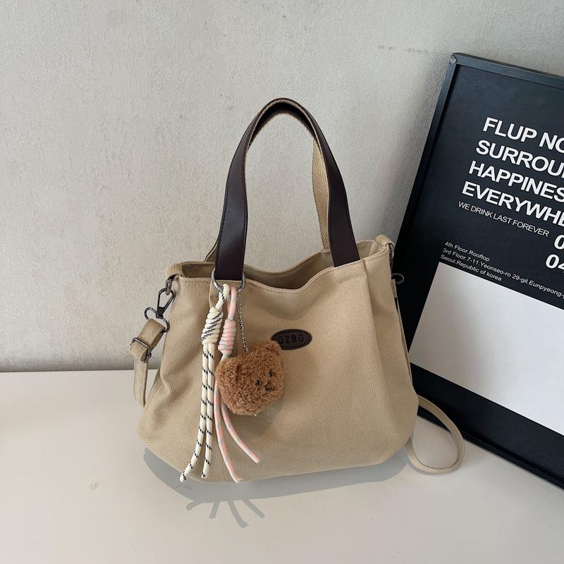 

Lazy wind canvas bag, new large-capacity shoulder pleated bag, versatile college student class tote bag