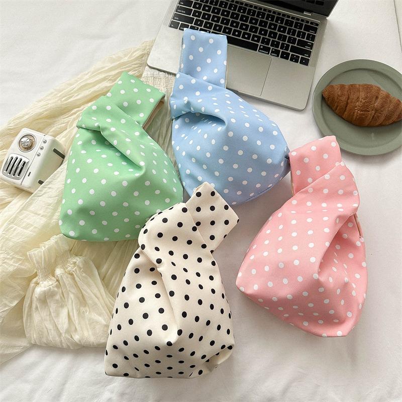 Wrist bag Canvas handbag Office worker going out handbag Internet celebrity handbag Change storage Small cloth bag