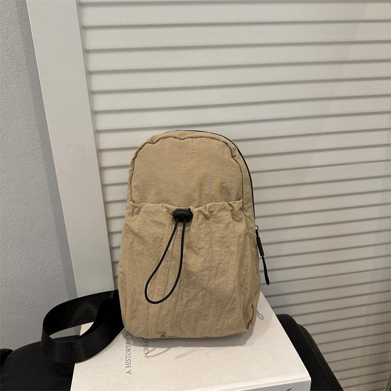 

Japanese breast bag for men and women 2025 new summer mini small backpack messenger bag casual shopping versatile mobile phone bag tide хакі