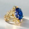 Huitan Luxury Gold Color Women Ring Inlaid Shining Blue Oval CZ Aesthetic Leaf Design Party Wedding Accessories Charming Jewelry
