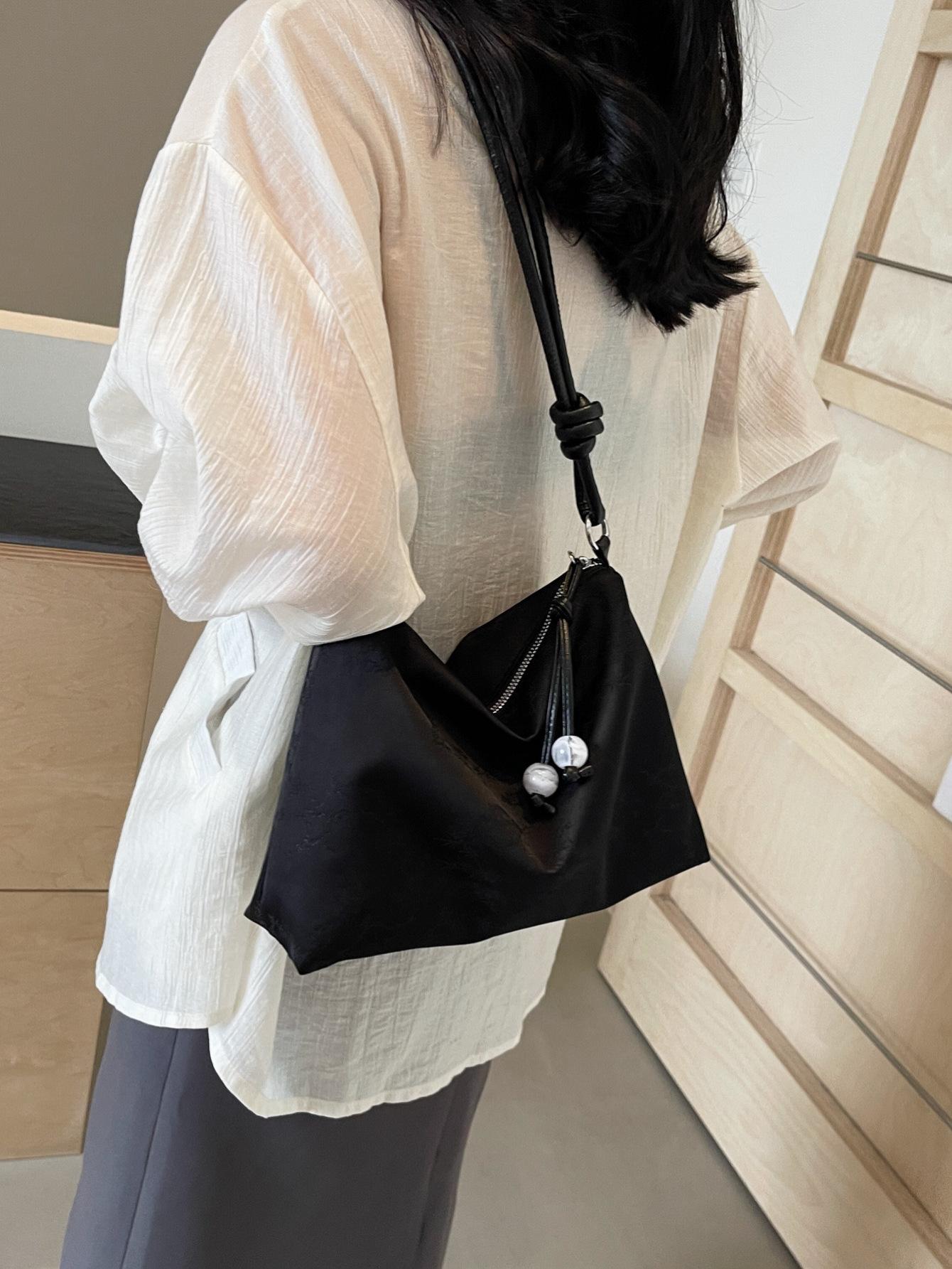 

New Chinese soft-faced women s bag 2025 new national style summer fashion work commuter bag large-capacity shoulder messenger bag