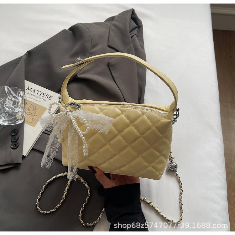 

2025 new high-end texture fashion messenger commuter bag niche design portable diamond chain bag shoulder bag жовтий