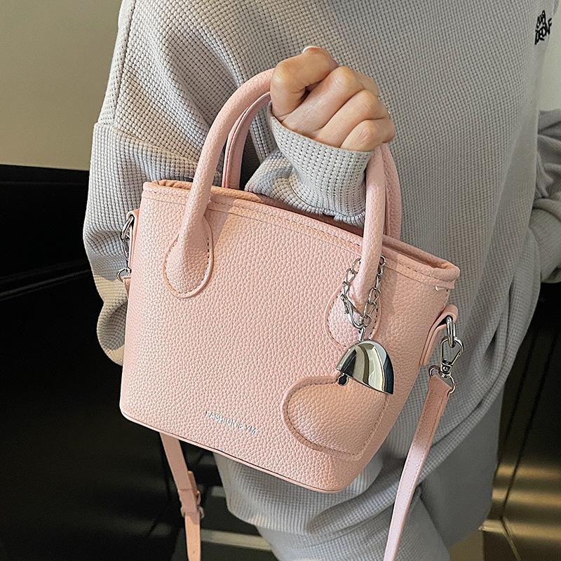 2025 New Fashion High Sense Temperament Simple Hand Carrying Bucket Bag Women's Niche Lychee Pattern Commuter Messenger Bag