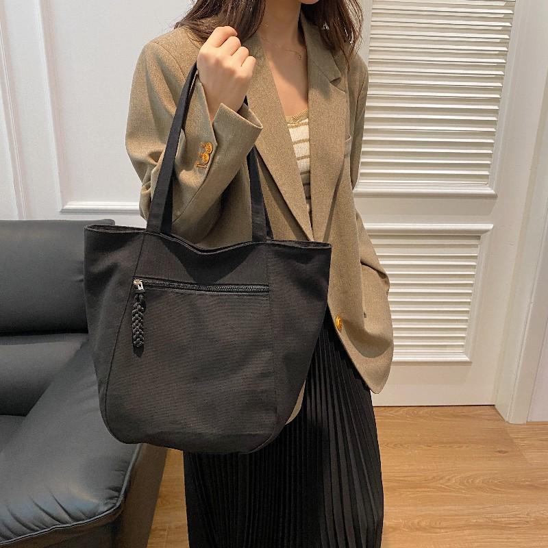 Customized bags for women 2025 new large-capacity tote bags, commuter tote bags, student women's shoulder bags.