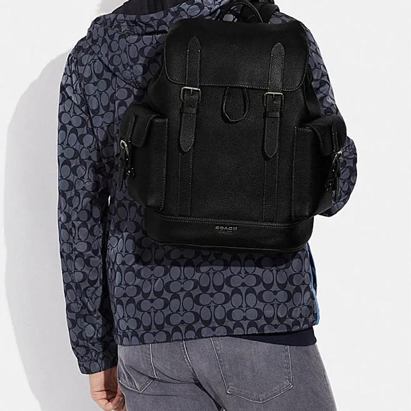 Coach Black Pebbled Leather Large Flap Backpack with Side Pockets for Daily Use