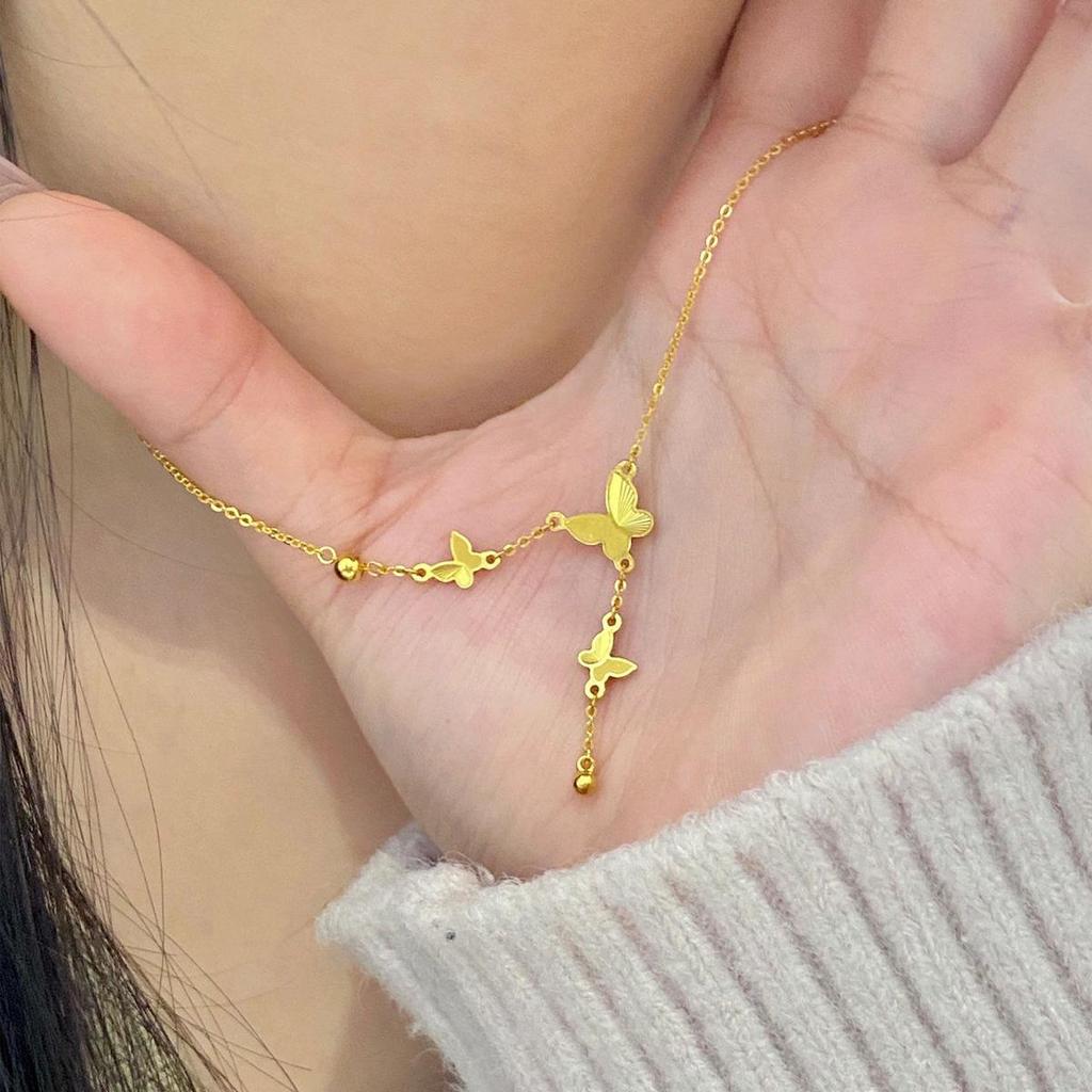 Golden Butterfly Tassel Necklace: Women's Versatile French Style, Elegant Niche Luxury Clavicle Chain.
