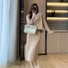 French Chic Women's Two-Piece Knitwear Set: Batwing Sleeve Pullover & Slim-Fit Split Over-the-Knee Skirt for Autumn/Winter.