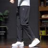 Skechers Men's Relaxed Fit Woven Athletic Pants