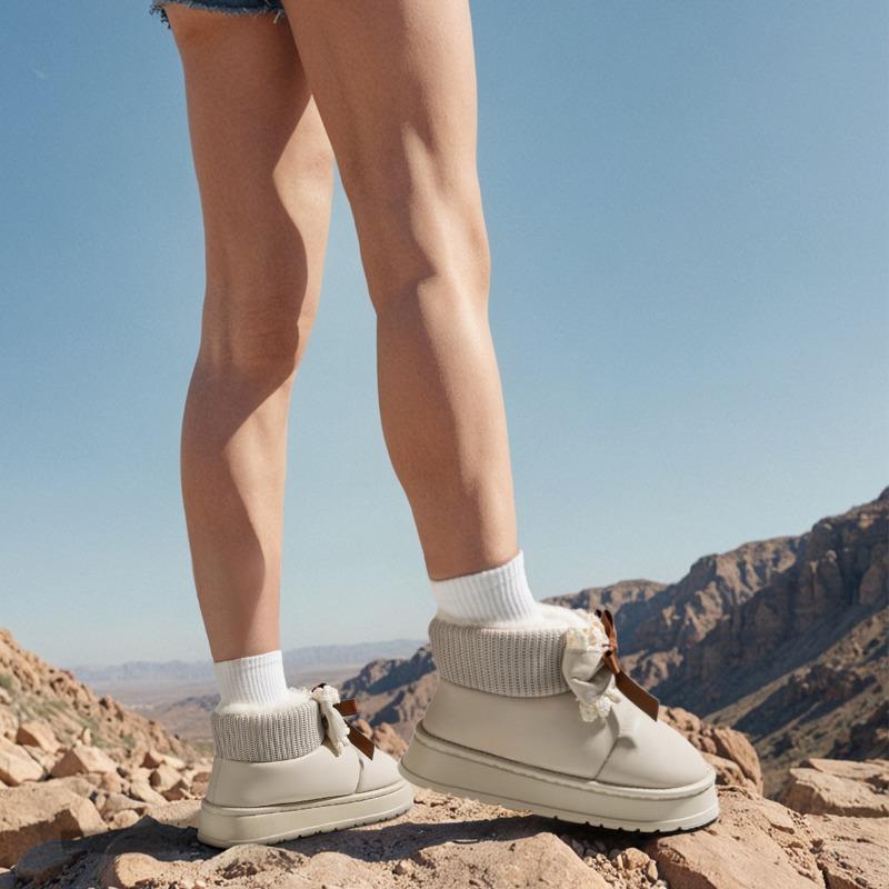 thick-soled snow boots women's new winter waterproof and non-slip piled thickened bow heightening outer wear cotton shoes