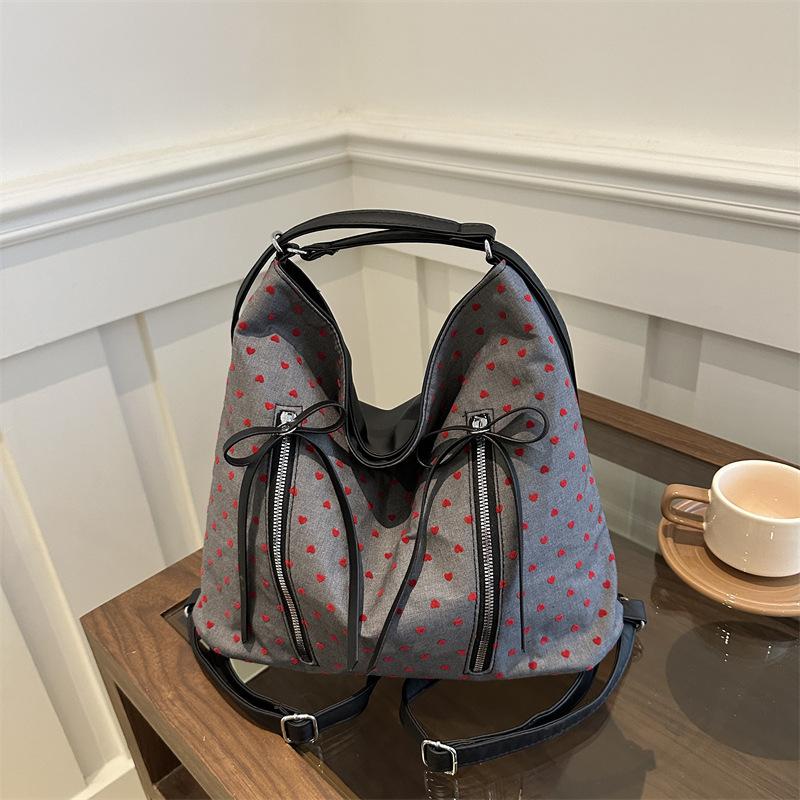 

Casual shoulder bag texture personalized double back class large-capacity bag women s 2025 new simple commuter tote bag