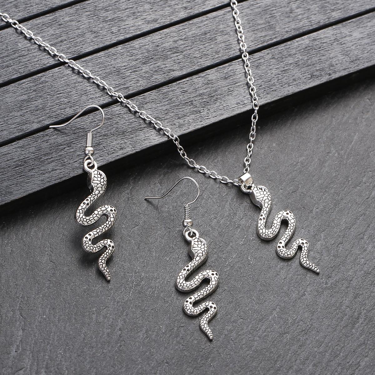 

2022 Панк Ожерелье с подвеской в виде змеи и серьги, медного цвета, с черепом и цирконами, комплекты для женщин, эффектные, популярные, цирконы, оптом