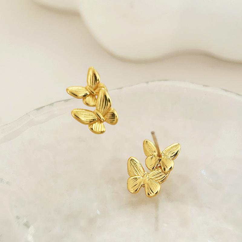Minimalistische Doppel-Schmetterling-Ohrringe: Elegante High-End Damen-Stecker mit modischem Design