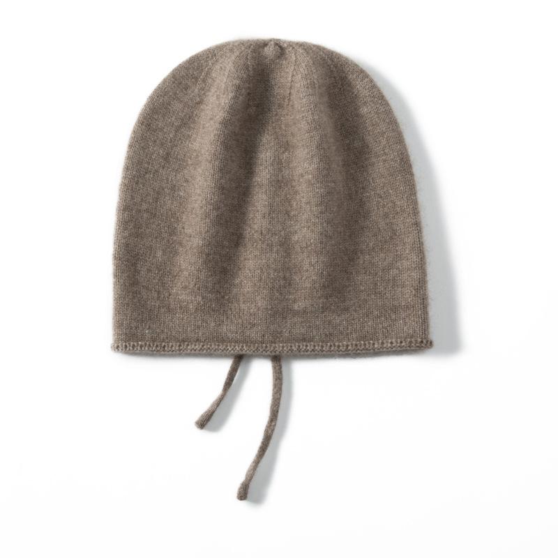Autumn and Winter New Cashmere Women's Knitted Hat Drawstring Warm Ear Protection Fashion Hat Crimping Stack Hat Cold Hat