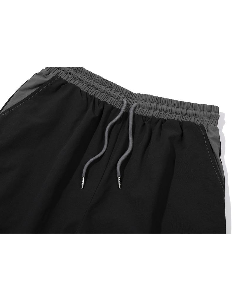 CPGN STUDIO Round Cut Dart Nylon Pants Black