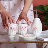Mädchen Wind Keramik Weißer Bogen Badezimmer Fünfteiliges Set Toilettenartikel Badezimmer-Kit Zubehör Mundspülbecher Lotionflasche Seifenschale