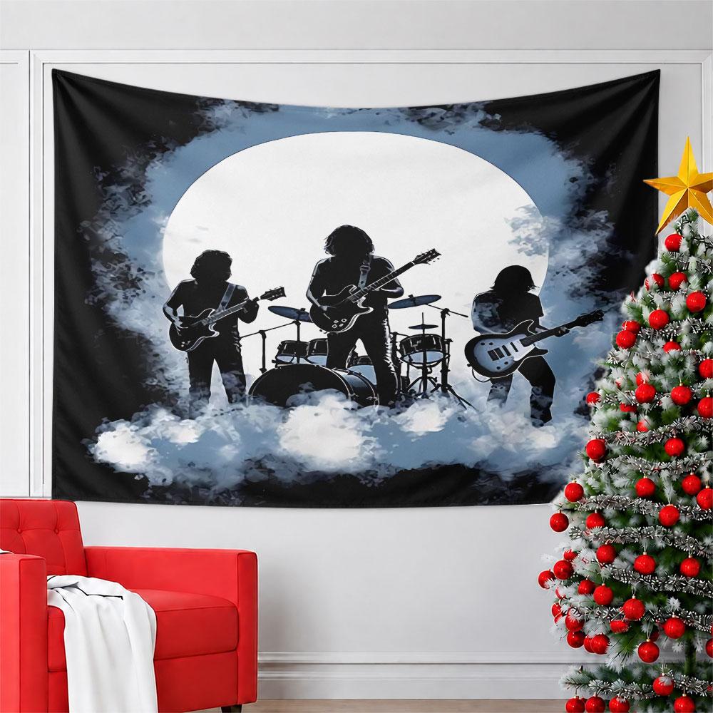 Silhouetted rock band performing against a full moon with smoky clouds. Patterned tapestry for bedroom and living room home decor
