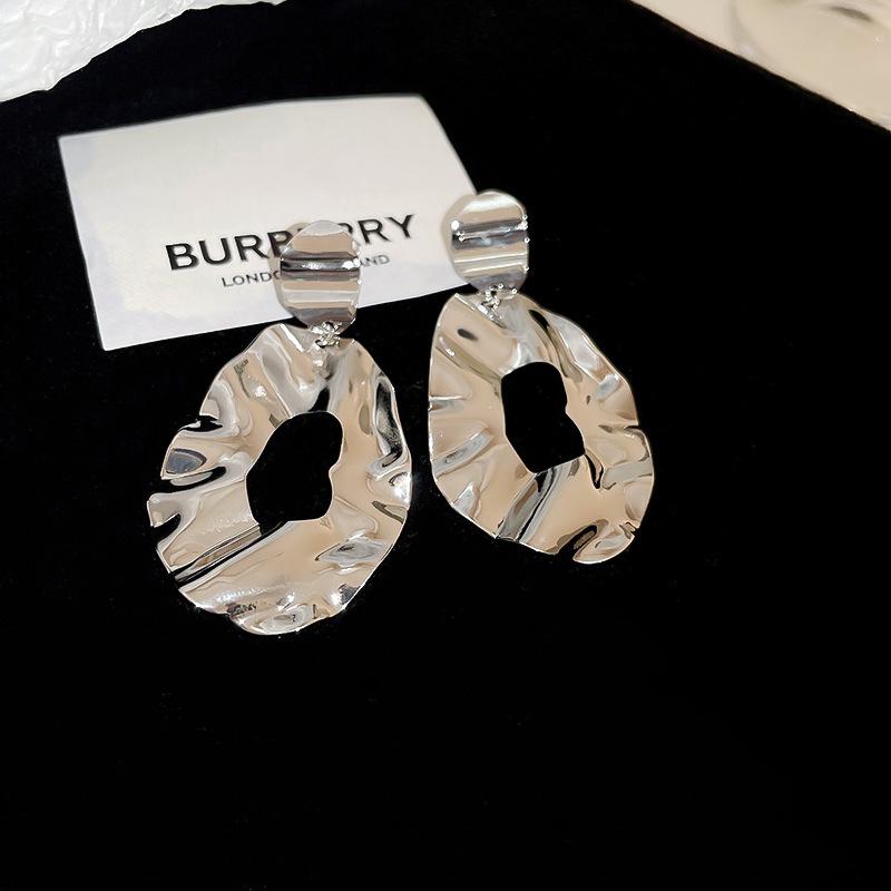Exquisite Silver Needle Flower Bow Tassel Earrings - Luxury European & American Style for Women