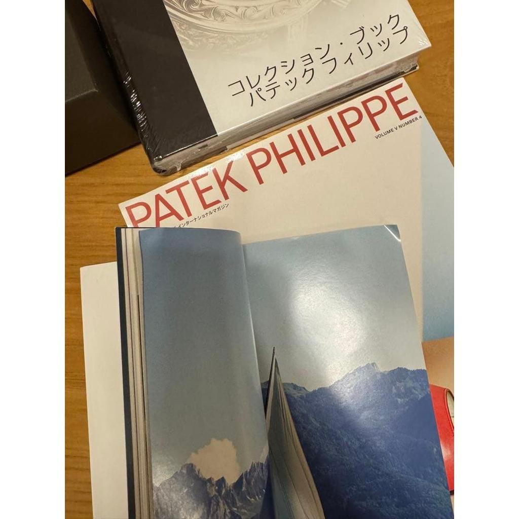 Used Patek Philippe collection book, 2 magazines, and travel case