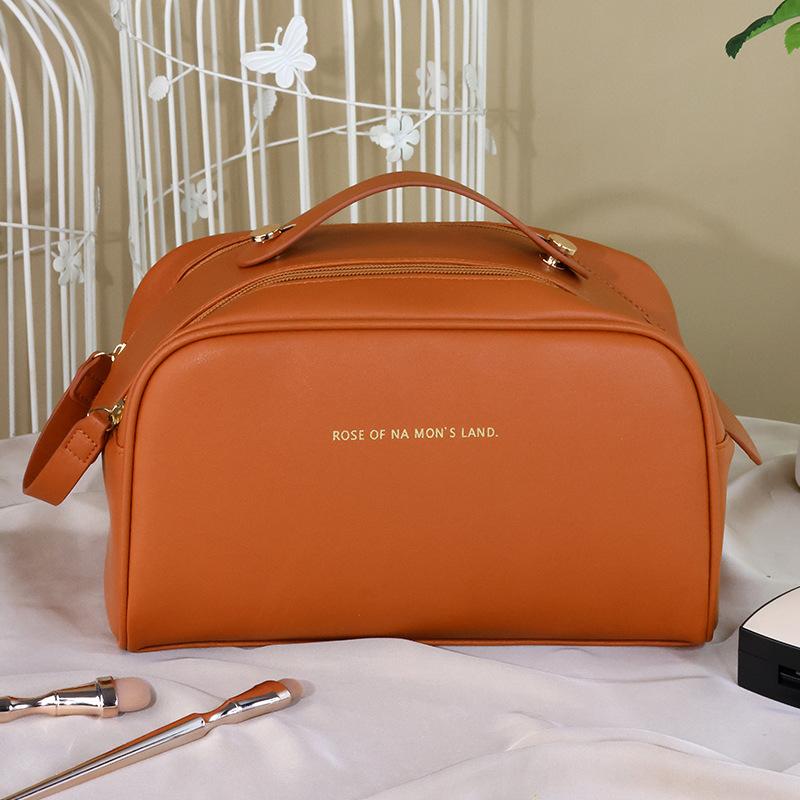 Cosmetic bag women's oversized capacity portable ins premium sense waterproof new travel makeup toilet bag storage bag