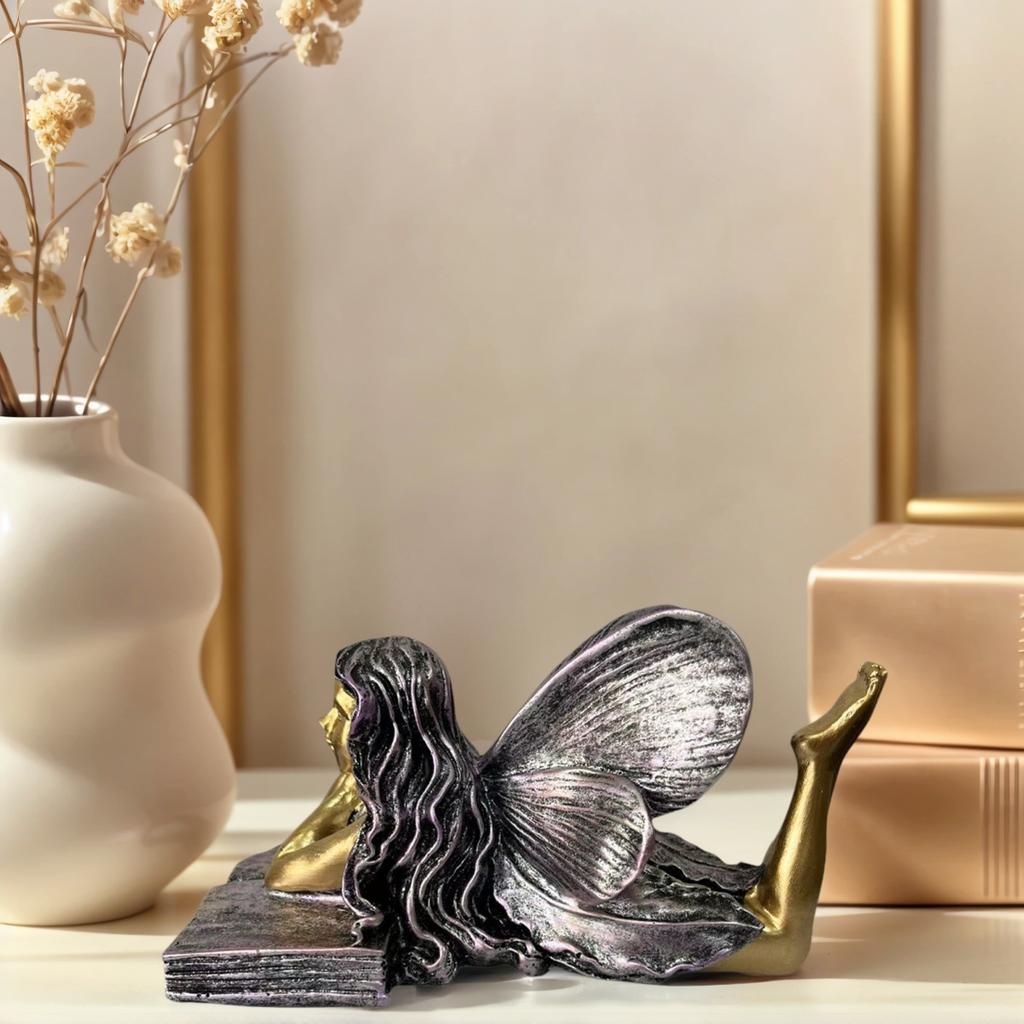 1 Resin Garden Fairy Statue Showing a Fairy Angel Girl Lying on a Book. This Statue Is Specially Designed to Install the Decoration of the Gro