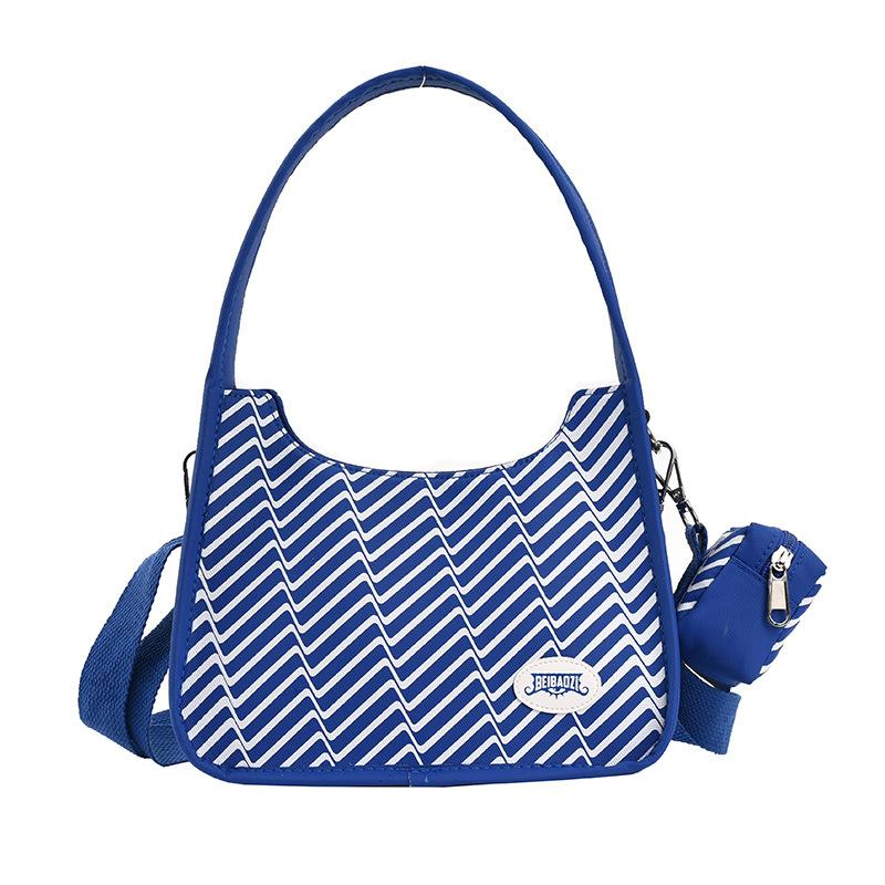 

Сумки Женские вместительные простые и легкие нейлоновые сумки Новые весенние сумки-багеты Нишевые холщовые сумки