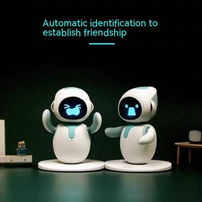 Robot intelligente per animali domestici AI Interazione emotiva Robot per animali domestici con batteria a lunga durata Robot giocattolo da tavolo