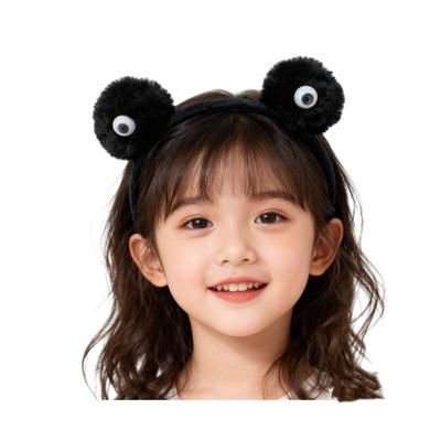Entzückendes Plüsch-Kohlemonster-Stirnband mit Kulleraugen - Perfekt für Herbst-/Winter-Frisuren oder die Make-up-Routine.