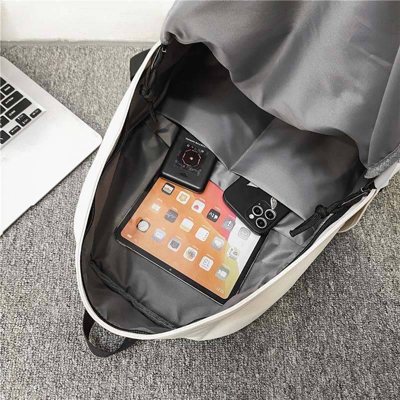 Simple and large-capacity unprinted backpack casual men's and women's same backpack junior high school solid color student schoolbag