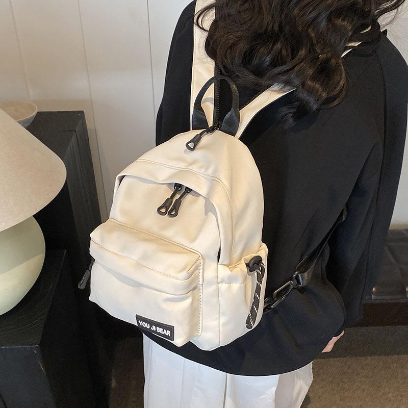Schoolbag simple and versatile small backpack female niche design ins style schoolbag Korean version single shoulder crossbody student multi-purpose 