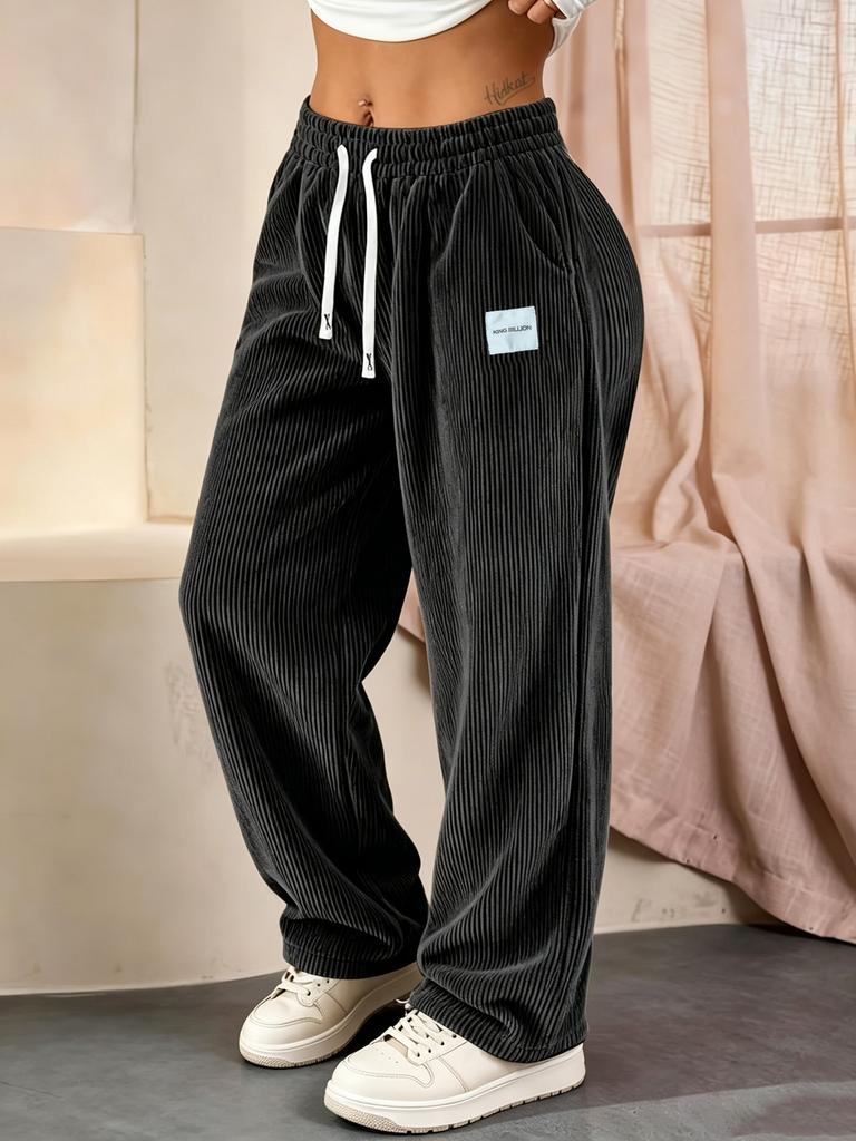 Pantaloni Larghi da Uomo in Velluto a Coste con Coulisse e Toppa Logo Laterale - Pantaloni Casual Streetwear