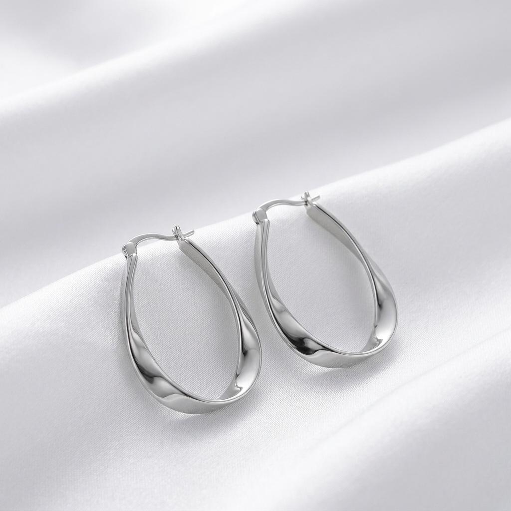 European and American style Mobius earrings women's simple twisted earrings light luxury high sense fashion French plain ring earrings