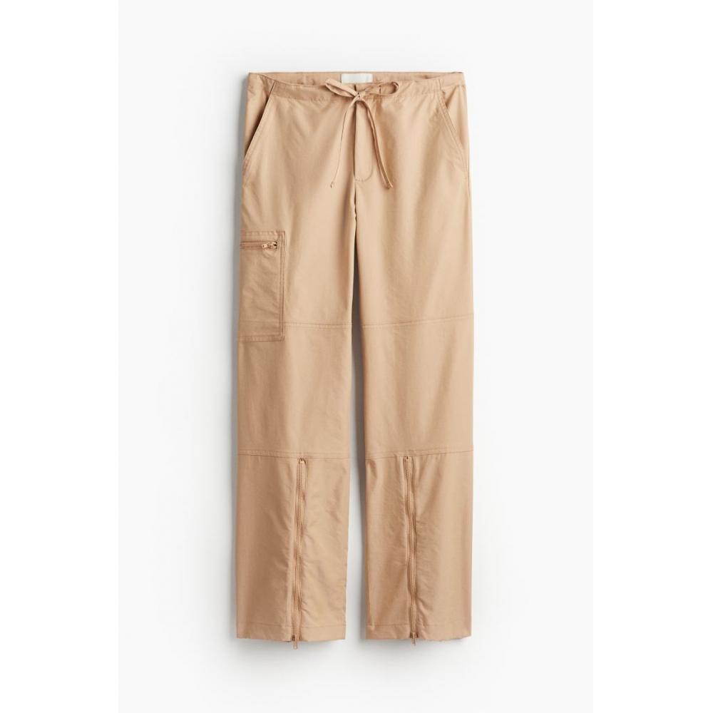 

Брюки с подолом на молнии HM бежевые