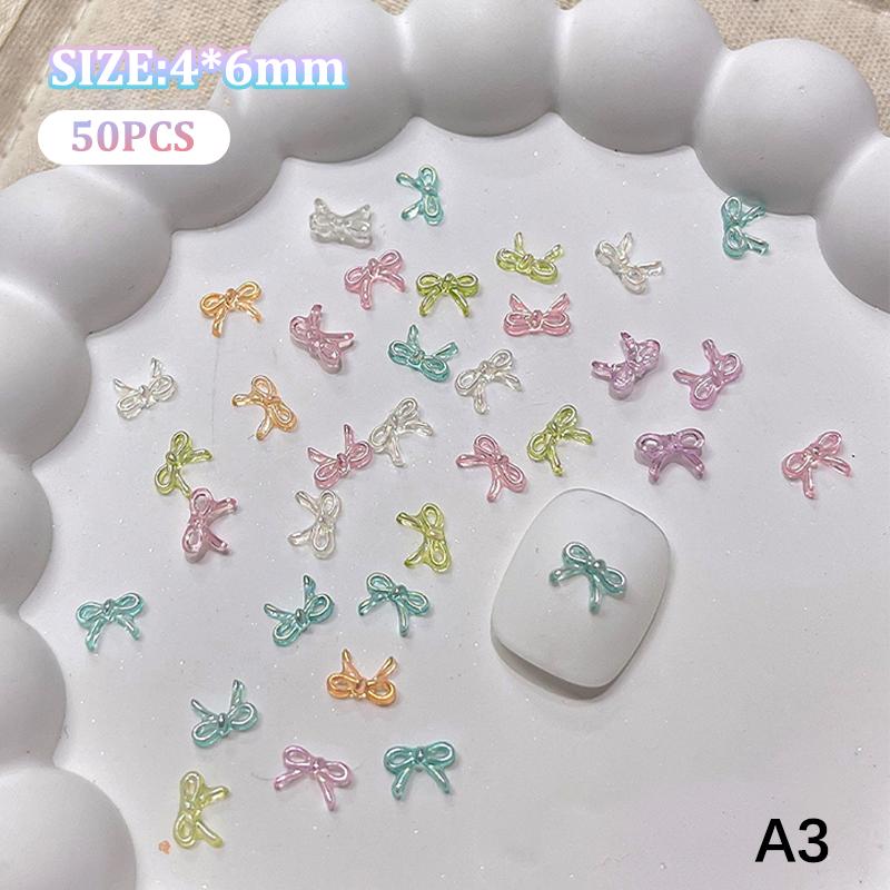 50Pcs Manicures Decoration Charm Colorful Bow Nail Art Accessory Illusionary AB Color Resin Ribbon Bows