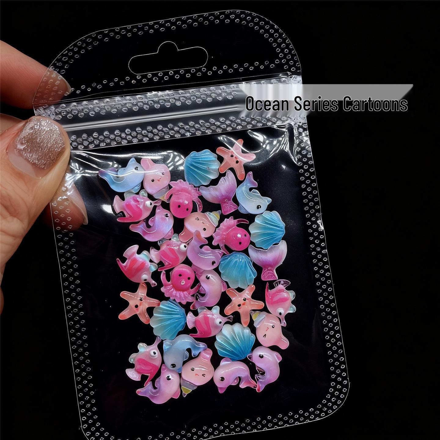 

Cartoon Nail Art: Glow-in-the-Dark Ocean Ornaments - Starfish, Seahorse & Dolphin.