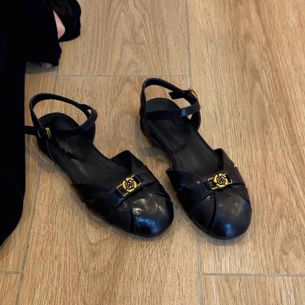 Sheepskin version camellia hollow breathable Roman shoes women's summer wear leather bag head shoes retro word with sandals