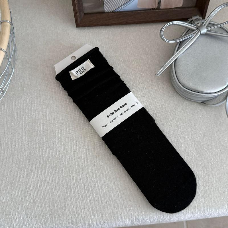 

Женские новые осенние тканевые стандартные однотонные носки из хлопка пиле с закрученным свободным краем и бесшовным носком 1 pair чёрный