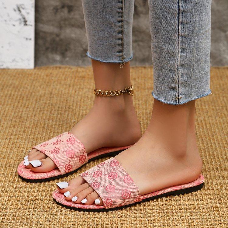 

Large size flat bottom one-character embroidered slippers women s round head outer wear light beach sandals slippers 43 рожевий