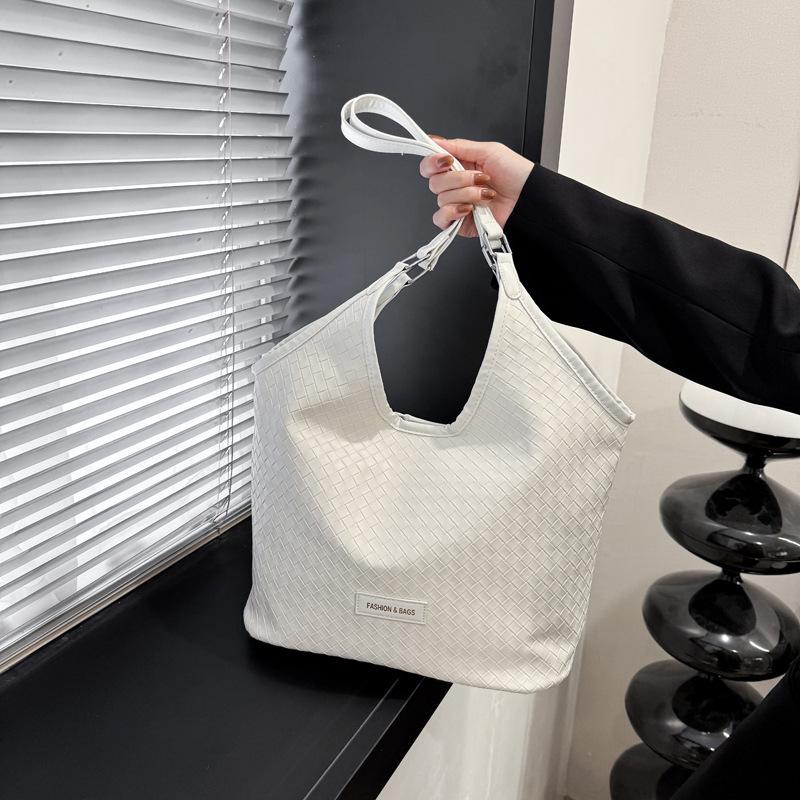 Soft leather casual woven underarm bag women's large-capacity new commuter premium tote bag