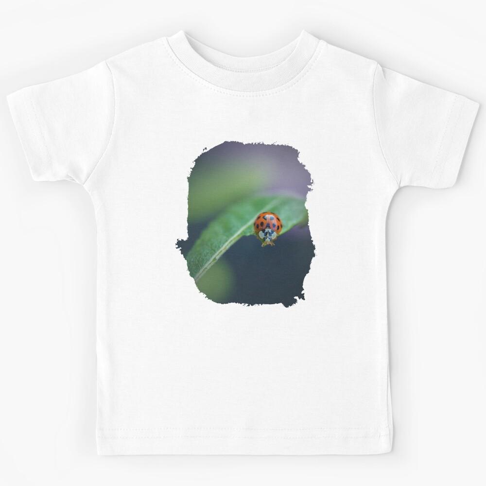 Hungry Ladybird in the garden. Kids T-Shirt 100