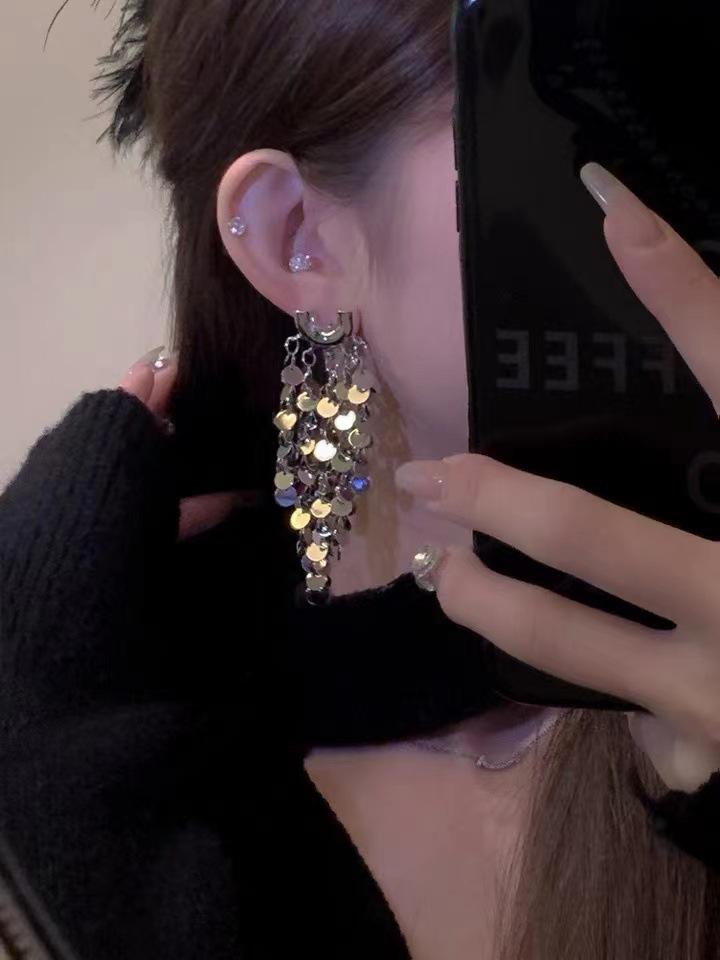 Silver Needle Sequin Tassel Earrings: Chic Cold Style, High-End Design, Fashionable Dangle for a Sophisticated Look.
