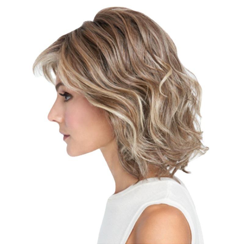 Nowy styl celebrytki, puszyste krótkie kręcone włosy