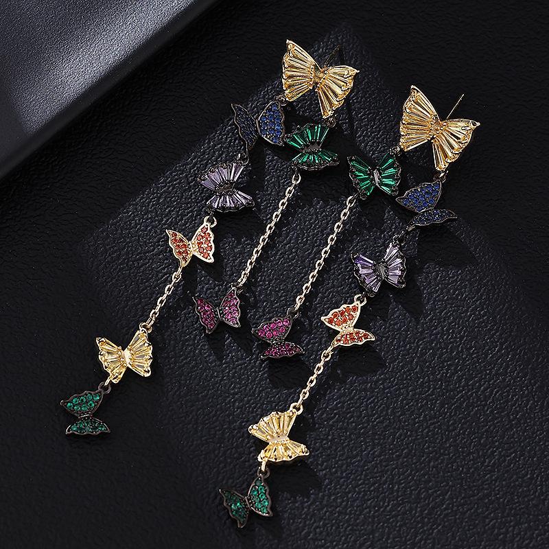 

Изысканные серьги-бабочки с цирконами и длинной кисточкой