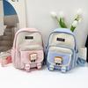 New primary school students backpack women's new large-capacity first and second grade schoolbag simple and fashionable contrasting color backpack