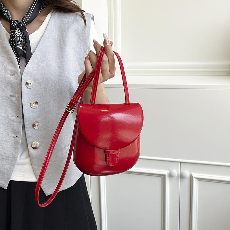 

High-end texture fashion new mini square bag women s versatile casual personality mini niche design messenger bag червоний