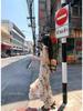 Niche Irregular Floral Print Waist-Cinching Elegant Suspender Dress for Spring & Summer