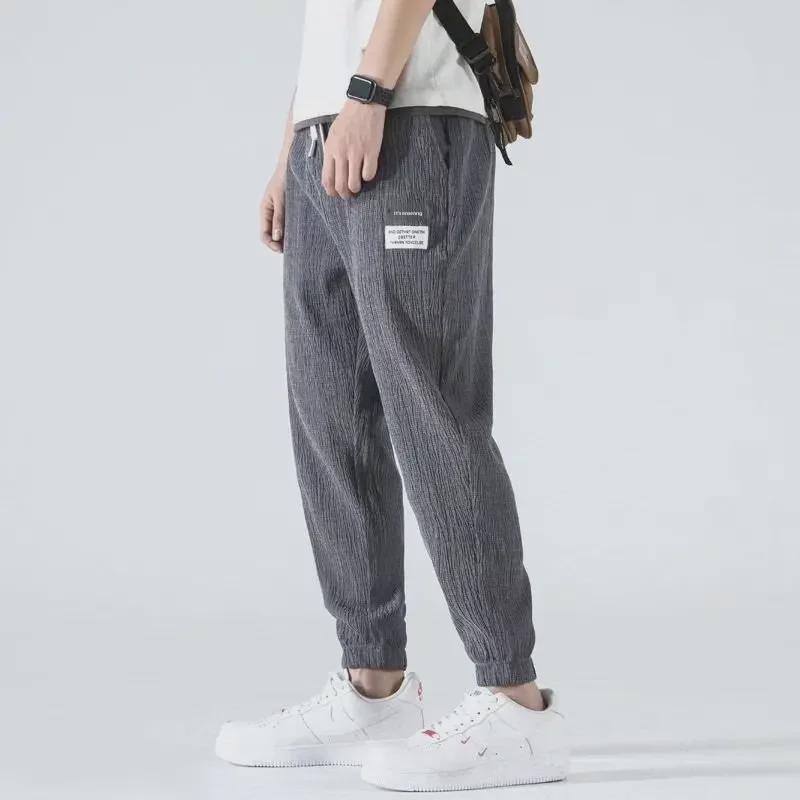 Men's 2024 Summer Ice Silk Loose Harem Pants - Korean Style, Lightweight, Casual, Large Size.