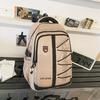 High-value retro tooling trendy and cool backpack for junior high school students, casual, simple, lightweight and large-capacity backpack.